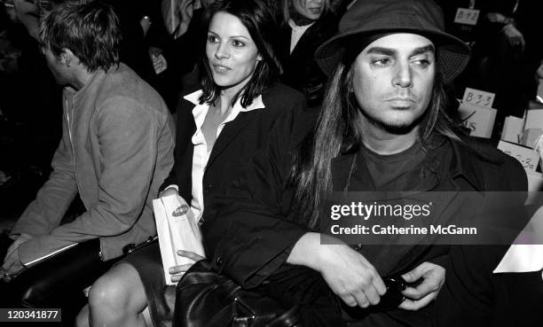 Steven Meisel with unidentified woman at Versace Versus fashion show on March 27, 1996 in New York City, New York.