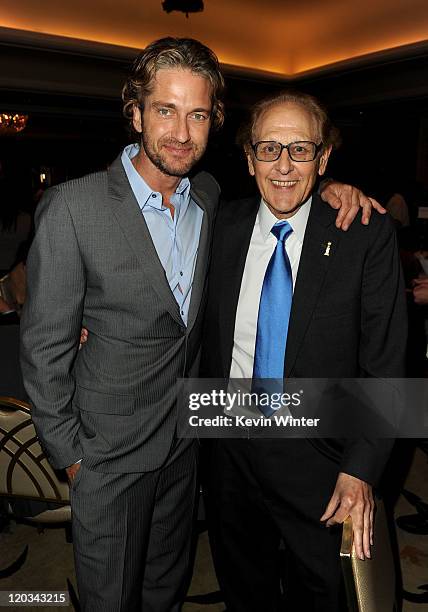 Actor Gerard Butler and Philip Berk attend The Hollywood Foreign Press Association's 2011 Installation Luncheon at Beverly Hills Hotel on August 4,...