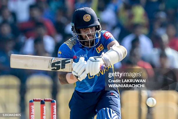 Sri Lanka's Kusal Mendis plays a shot during the second one day international cricket match between Sri Lanka and West Indies at the Sooriyawewa...