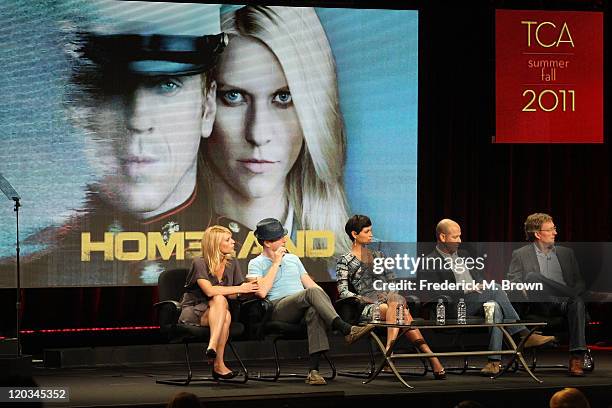 Actors Claire Danes, Damian Lewis and Morena Baccarin and Executive Producers Howard Gordon and Alex Gansa speak during the 'Homeland' panel during...