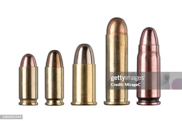 a collection of handgun bullets - pistol stock pictures, royalty-free photos & images