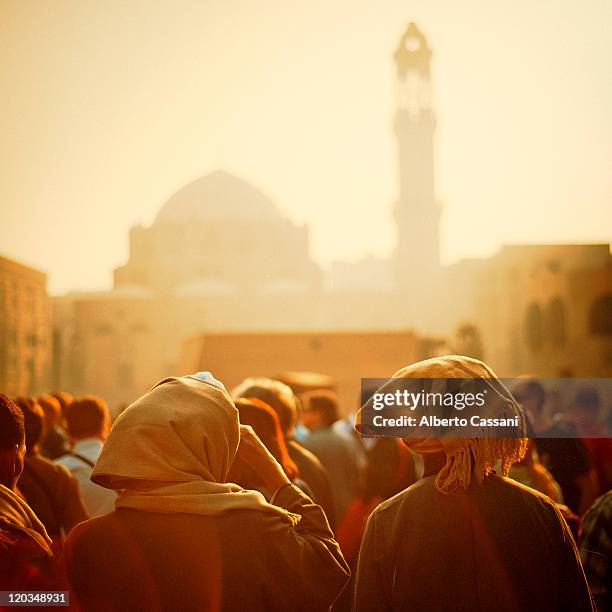 people at sunset - cairo city stock-fotos und bilder