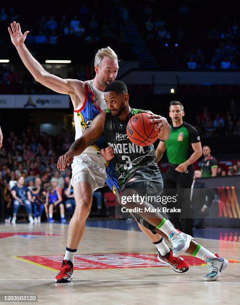 John Roberson of the Phoenix takes on Brendan Teys of the 36ers during the round 18 NBL between Adelaide 36ers and the South East Melbourne Phoenix...