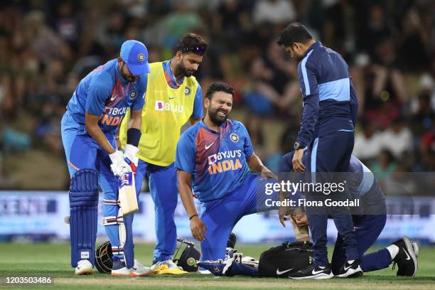 Virat Kohli suffers a leg injury and retires during game five of the Twenty20 series between New Zealand and India at Bay Oval on February 02, 2020...