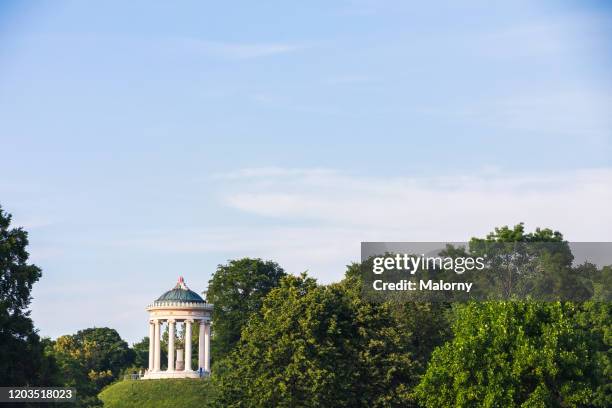 monopteros at the english garden in munich. - englischer garten stock-fotos und bilder