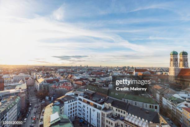 frauenkirche at marienplatz in munich. panoramic skyline - marienplatz stock pictures, royalty-free photos & images