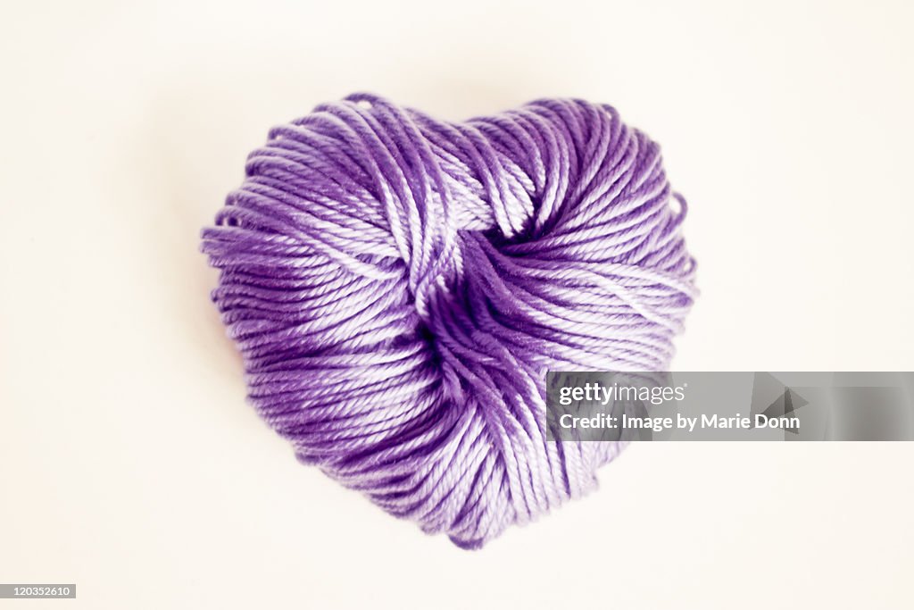Woollen yarn in purple colour
