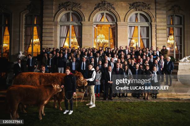 President of the National Assembly Richard Ferrand , farmers, students of Limoges agricultural school and members of parliament pose for a picture...