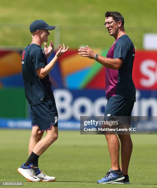 Jordan Cox of England talks to Jon Lewis, Head Coach of England during the England nets session at Willowmoore Park on February 02, 2020 in Benoni,...