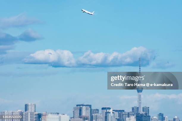 the airplane taking off the airport in tokyo of japan - haneda tokyo bildbanksfoton och bilder
