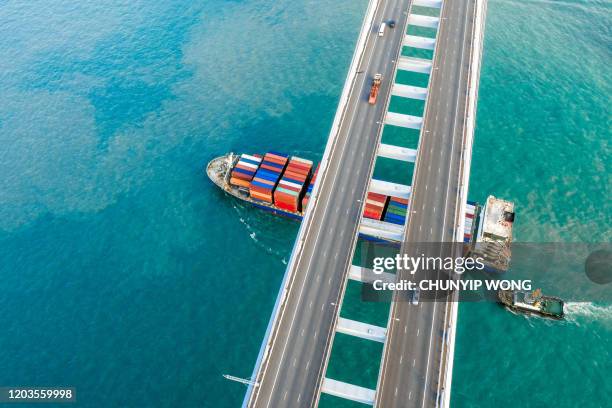 container cargo freight ship terminal in hongkong, china - sea road stock pictures, royalty-free photos & images