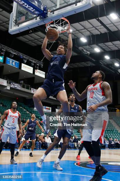 Moses Brown of the Texas Legends dunks against Jarell Martin of the Rio Grande Valley Vipers during the fourth quarter on February 26, 2020 at...