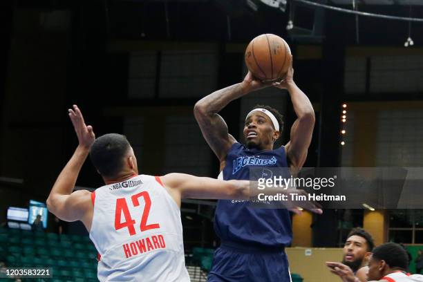 Antonius Cleveland of the Texas Legends shoots over William Howard of the Rio Grande Valley Vipers during the fourth quarter on February 26, 2020 at...