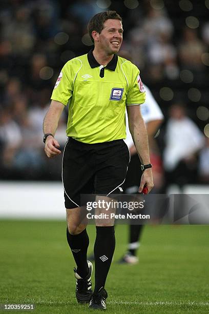 Referee Ian Rathbone in action during the Pre-Season match between Corby Town and Stevenage at Steel Park on August 2, 2011 in Corby, England.