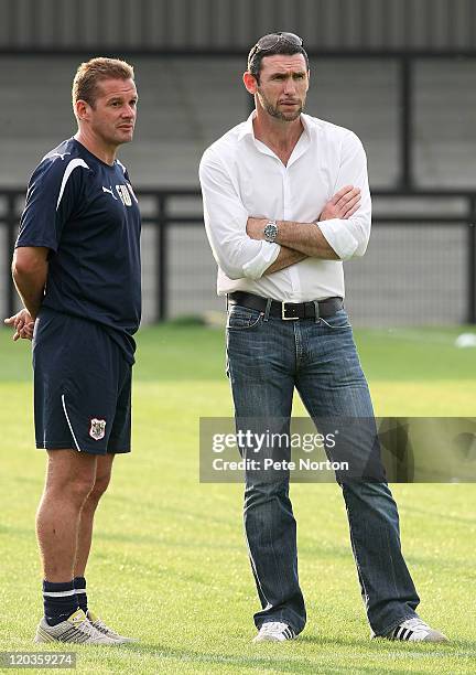 Stevenage manager Graham Westley and Martin Keown prior to the Pre-Season match between Corby Town and Stevenage at Steel Park on August 2, 2011 in...