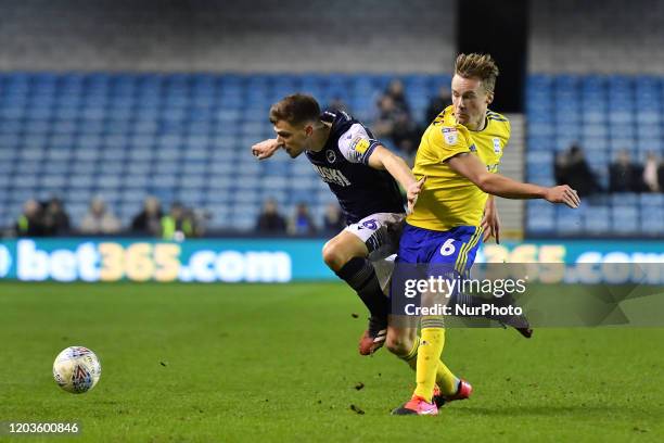 Jayson Molumby of Millwall battles for possession with Maikel Kieftenbeld of Birmingham during the Sky Bet Championship match between Millwall and...