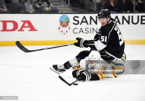 Los Angeles Kings right wing Austin Wagner falls on top of Pittsburgh Penguins Defenceman Jack Johnson while trying to get a shot on goal on February...