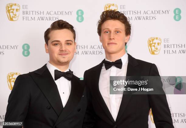 Dean-Charles Chapman and George MacKay pose in the Winners Room during the EE British Academy Film Awards 2020 at Royal Albert Hall on February 02,...