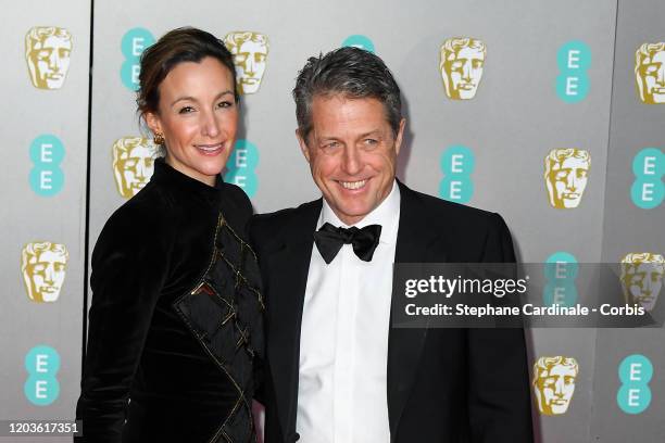 Anna Eberstein and Hugh Grant attend the EE British Academy Film Awards 2020 at Royal Albert Hall on February 02, 2020 in London, England.