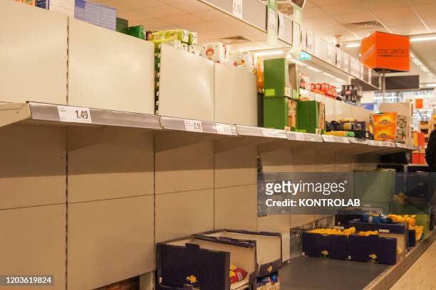 An empty shelf in a supermarkets stormed by the Romanian population frightened by the coronavirus present in Italy and worried by the many fellow...