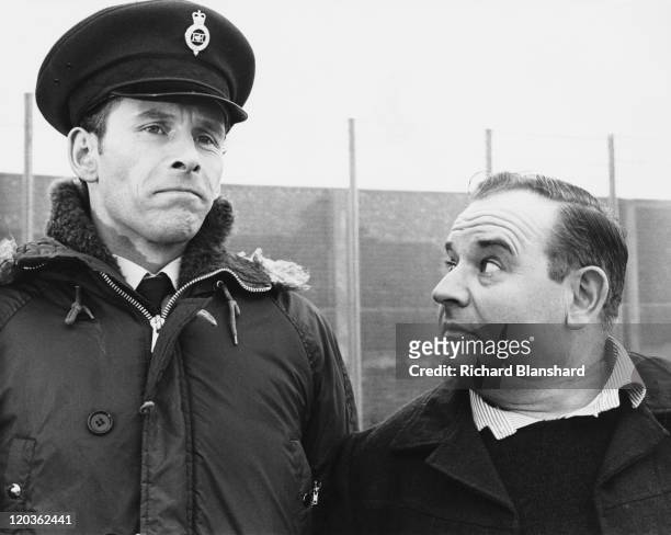 British actor and comedian Ronnie Barker stars with Christopher Godwin in the film 'Porridge', based on the television prison drama of the same name,...