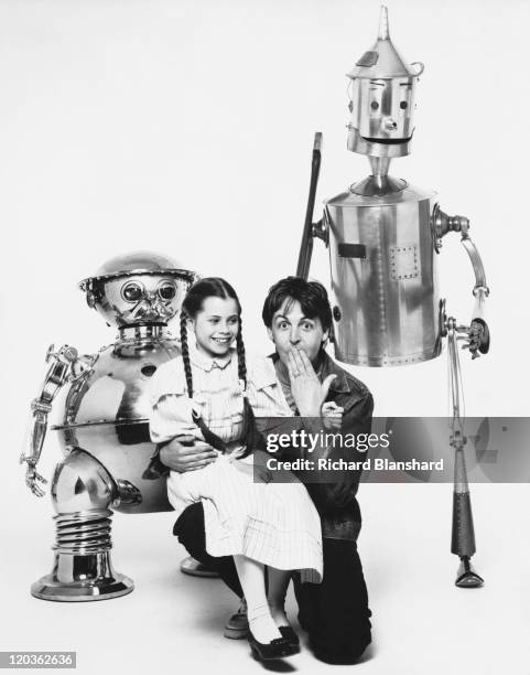 American actress Fairuza Balk poses with English singer, songwriter and musician Paul McCartney, as well as characters Tik-Tok and the Tin Woodman,...