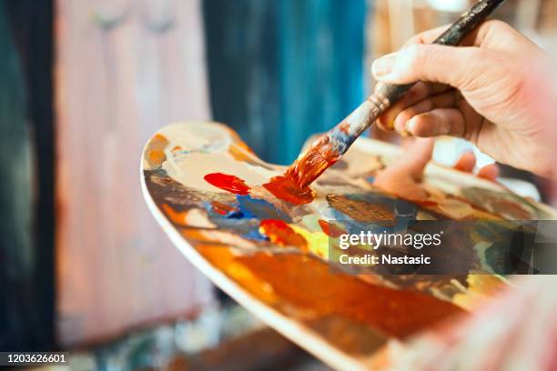 artist painting - oil painting stock pictures, royalty-free photos & images