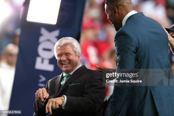 Former NFL head coach and Fox Sports analyst Jimmy Johnson talks with former NFL player and Fox Sports analyst Michael Strahan prior to Super Bowl...