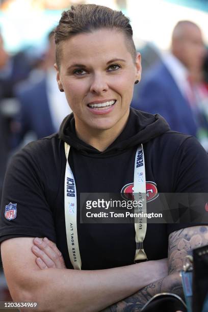 Offensive assistant coach Katie Sowers of the San Francisco 49ers looks during warmups prior to Super Bowl LIV against the Kansas City Chiefs at Hard...