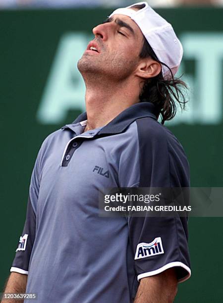 Brazilian tennis player, Fernando Meligeni loses 21 February 2002 his match against argentinian, Agustin Caleri in the second round of the ATP...