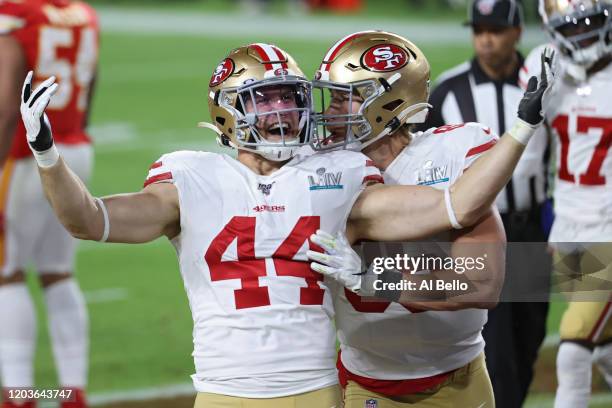 Kyle Juszczyk of the San Francisco 49ers reacts after scoring a touchdown on a 15-yard reception against the Kansas City Chiefs during the second...