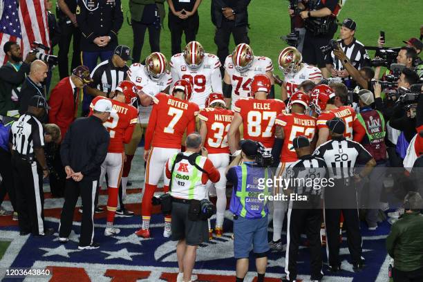 Referee Bill Vinovich toss the coin prior to Super Bowl LIV between the San Francisco 49ers and the Kansas City Chiefs at Hard Rock Stadium on...