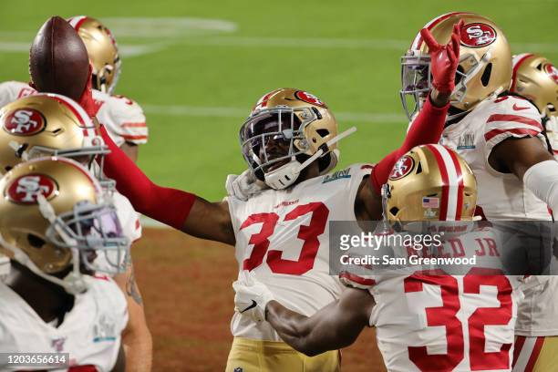 Tarvarius Moore of the San Francisco 49ers celebrates after intercepting a pass by Patrick Mahomes of the Kansas City Chiefs during the third quarter...