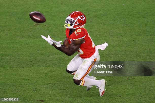 Tyreek Hill of the Kansas City Chiefs makes a catch against the San Francisco 49ers during the fourth quarter in Super Bowl LIV at Hard Rock Stadium...