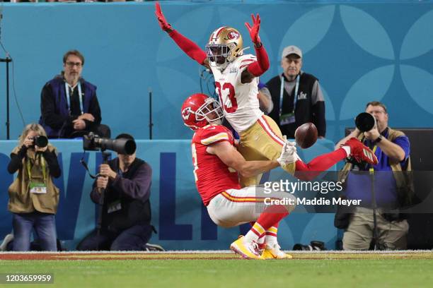 Tarvarius Moore of the San Francisco 49ers interferes with a pass intended for Travis Kelce of the Kansas City Chiefs during the fourth quarter in...