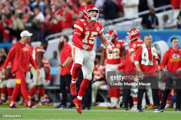 Patrick Mahomes of the Kansas City Chiefs celebrates after throwing a touchdown pass against the San Francisco 49ers during the fourth quarter in...