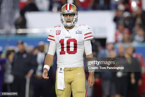 Jimmy Garoppolo of the San Francisco 49ers reacts against the Kansas City Chiefs during the fourth quarter in Super Bowl LIV at Hard Rock Stadium on...