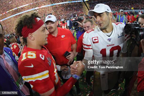Patrick Mahomes of the Kansas City Chiefs shakes hands with Jimmy Garoppolo of the San Francisco 49ers after Super Bowl LIV at Hard Rock Stadium on...
