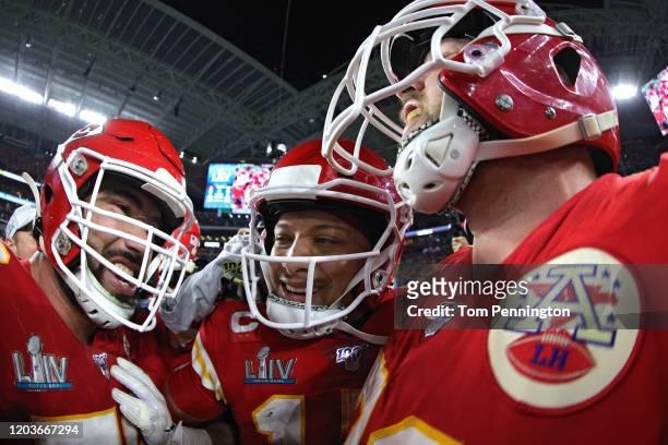 Patrick Mahomes of the Kansas City Chiefs celebrates with teammates after defeating the San Francisco 49ers 31-20 in Super Bowl LIV at Hard Rock...