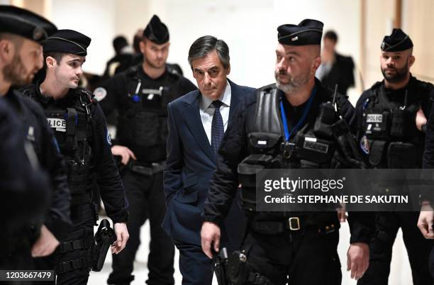 Former French Prime minister Francois Fillon returns to the courtroom at the Paris' courthouse, on February 27 for the hearing of the trial over...