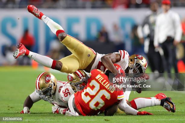 Damien Williams of the Kansas City Chiefs is tackled against the San Francisco 49ers in Super Bowl LIV at Hard Rock Stadium on February 02, 2020 in...