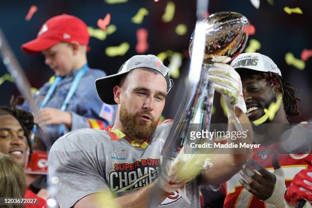 Travis Kelce of the Kansas City Chiefs celebrates with the Vince Lombardi Trophy after defeating the San Francisco 49ers 31-20 in Super Bowl LIV at...