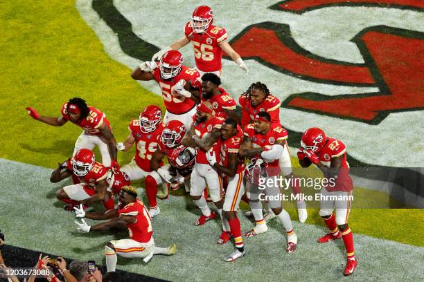 Kansas City Chiefs players celebrate after an interception of Kendall Fuller during the fourth quarter against the San Francisco 49ers in Super Bowl...