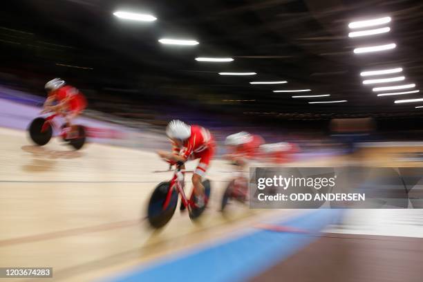 Denmark's Lasse Norman Hansen, Denmark's Julius Johansen, Denmark's Frederik Rodenberg Madsen and Denmark's Rasmus Pedersen compete in the men's Team...