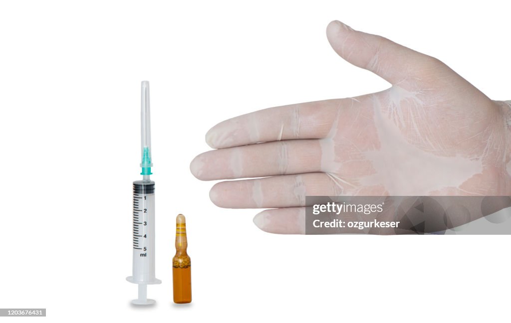 Hand Using A Syringe Hand With Syringe And Medicine High-Res Stock Photo - Getty Images