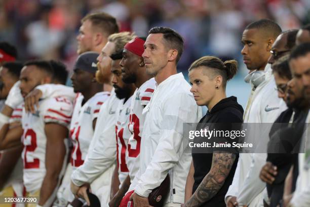 Head coach Kyle Shanahan of the San Francisco 49ers and offensive assistant coach Katie Sowers look on prior to Super Bowl LIV against the Kansas...