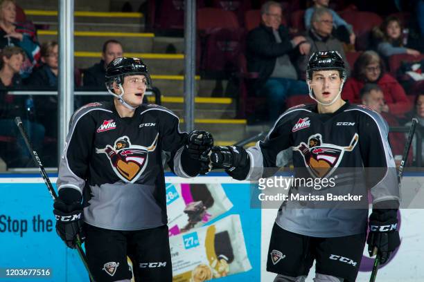 Michal Kvasnica and Kaden Kohle of the Vancouver Giants fist bump to celebrate a goal against the Kelowna Rockets at Prospera Place on January 26,...