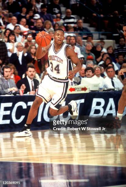 University of Connecticut shooting guard Ray Allen heads up court on fastbreak during a basketball game, Hartford, CT, January 1995.