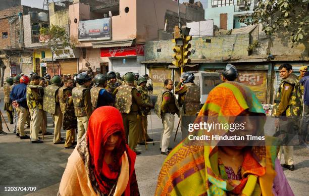 Security personnel patrol streets following communal violence over the Citizenship Amendment Act , at Yamuna Vihar on February 27, 2020 in New Delhi,...