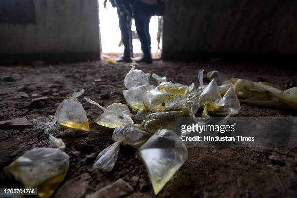 Plastic bags filled with acid seen at the premises of Aam Admi Party councillor Tahir Hussain after communal violence over the Citizenship amendment...